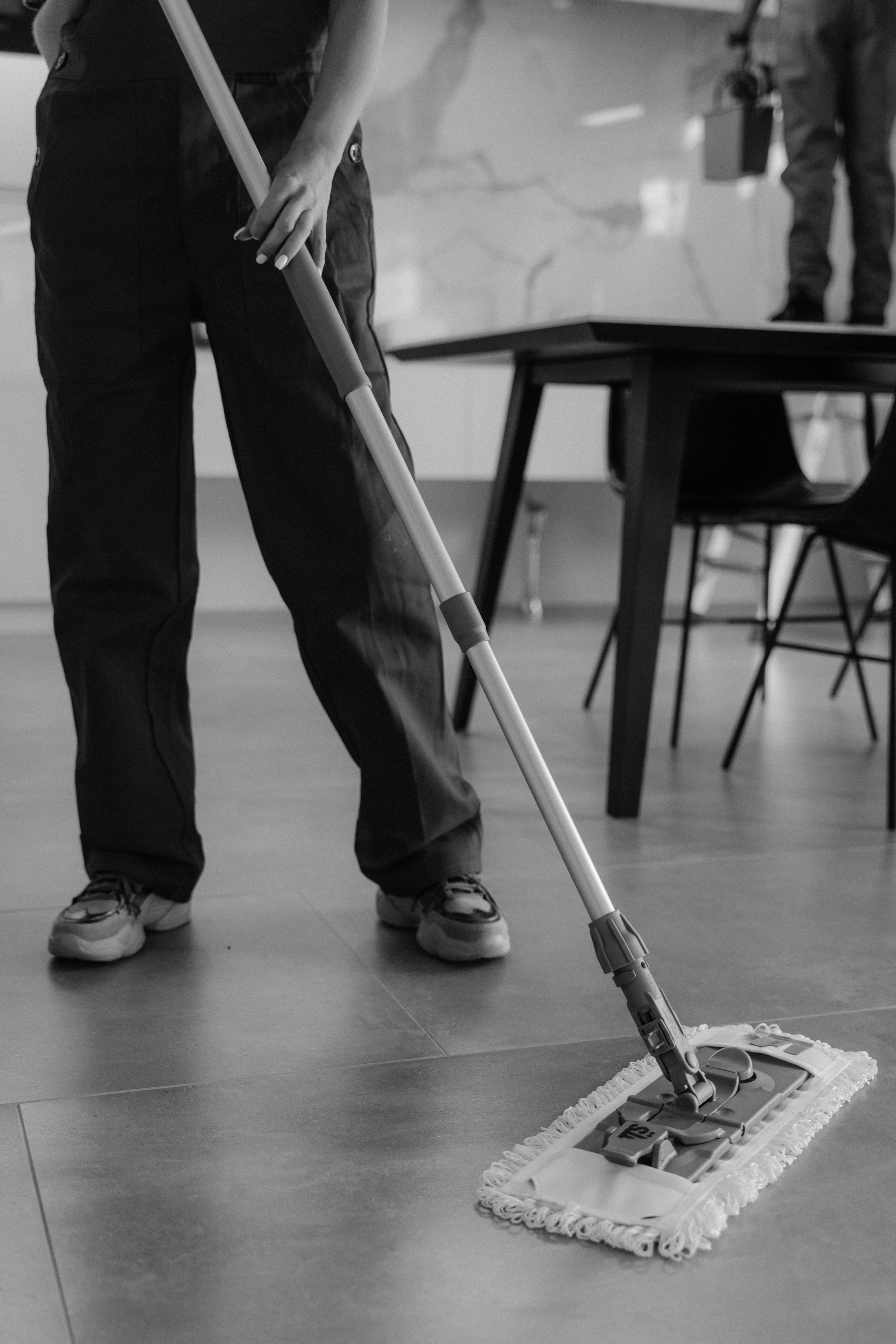 Cleaning a commercial tiled floor with a flat mop